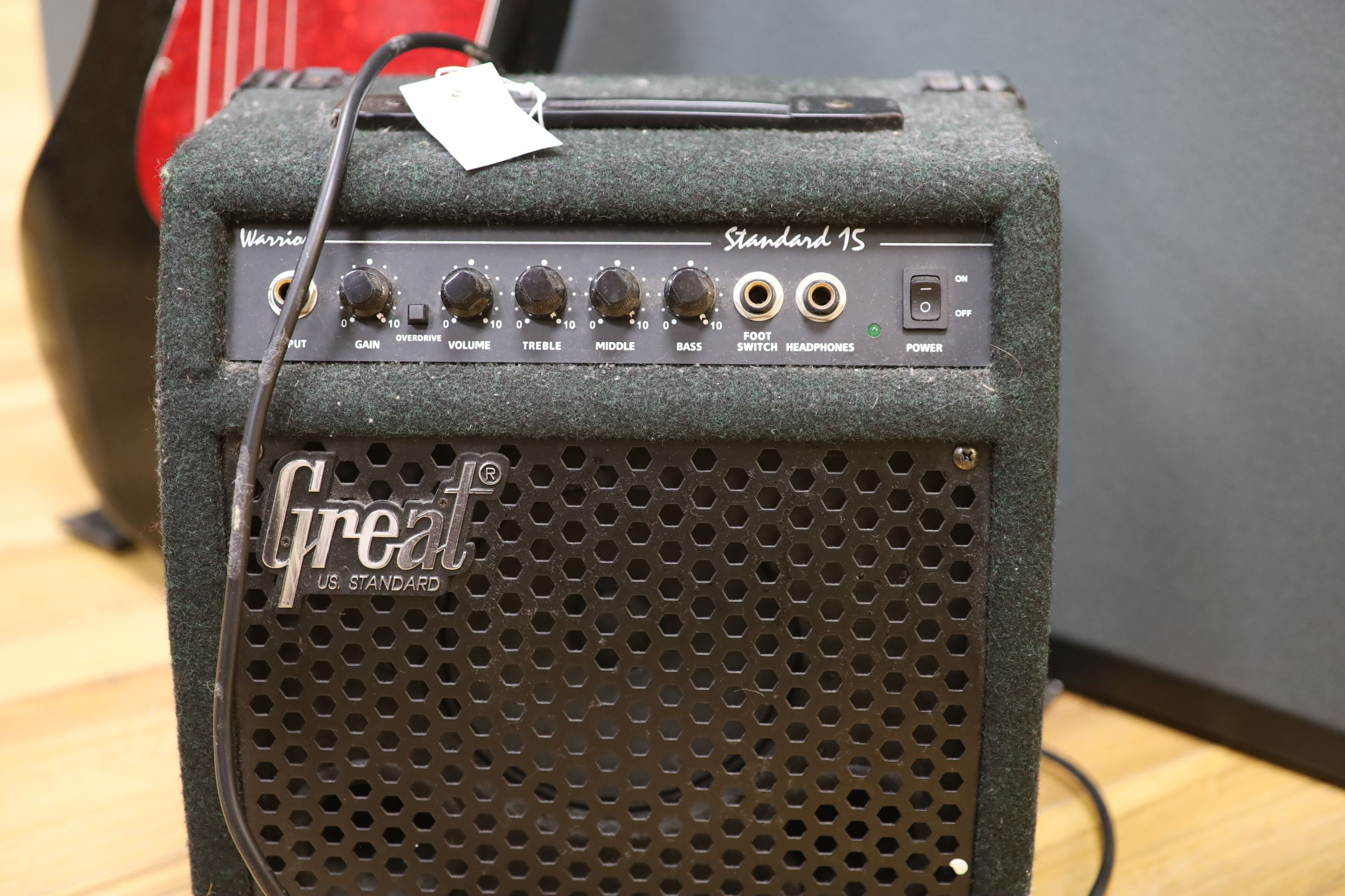 A Rock tile electric base guitar and a Great amplifier